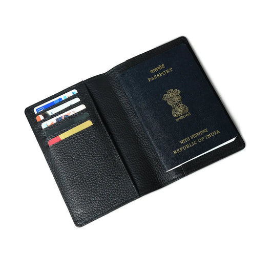 Black leather travel wallet with passport slot and six card slots, blue Indian passport visible on Tampa Home & Garden Store