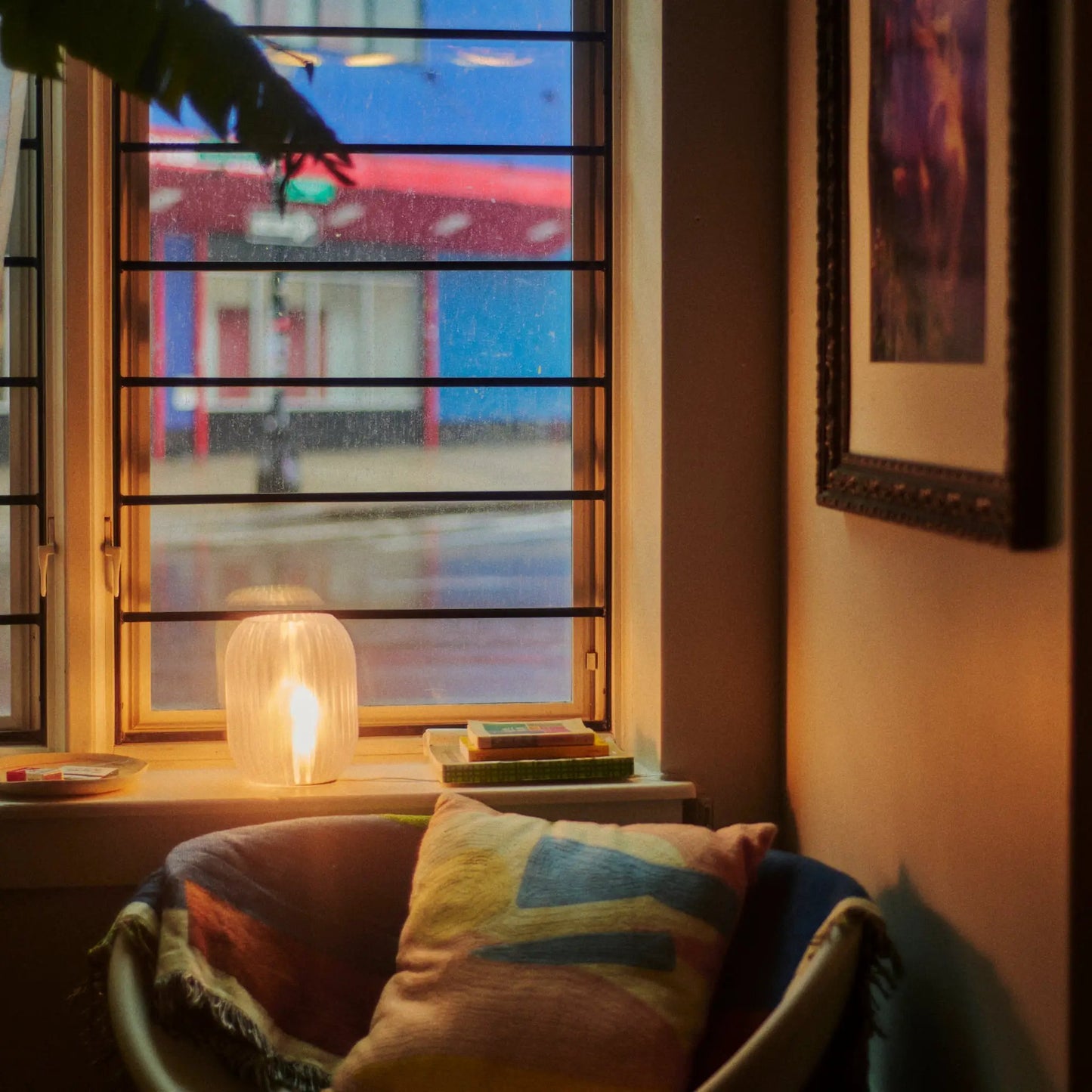 Allium Lamp by Christopher Merchant and Wooj Design; white ribbed glass table lamp on windowsill on Tampa Home & Garden Store