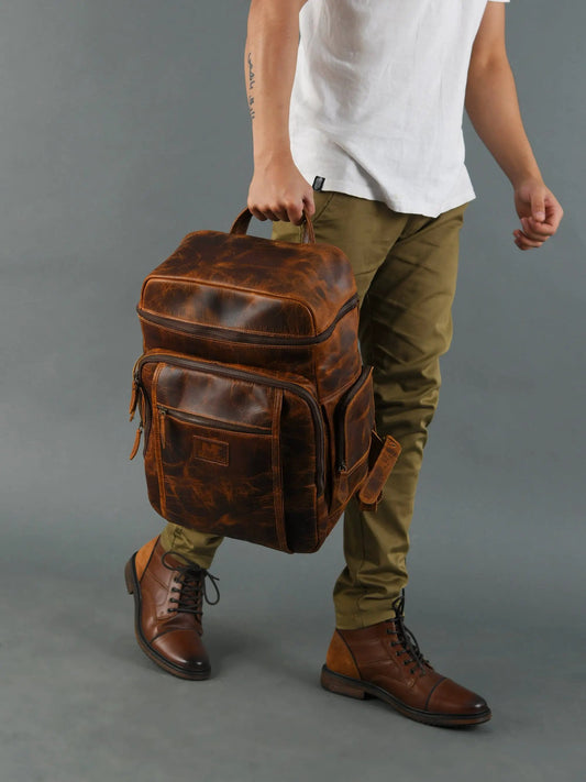 Alpha Caramel buffalo leather laptop backpack with top handle and distressed brown finish on Tampa Home & Garden Store