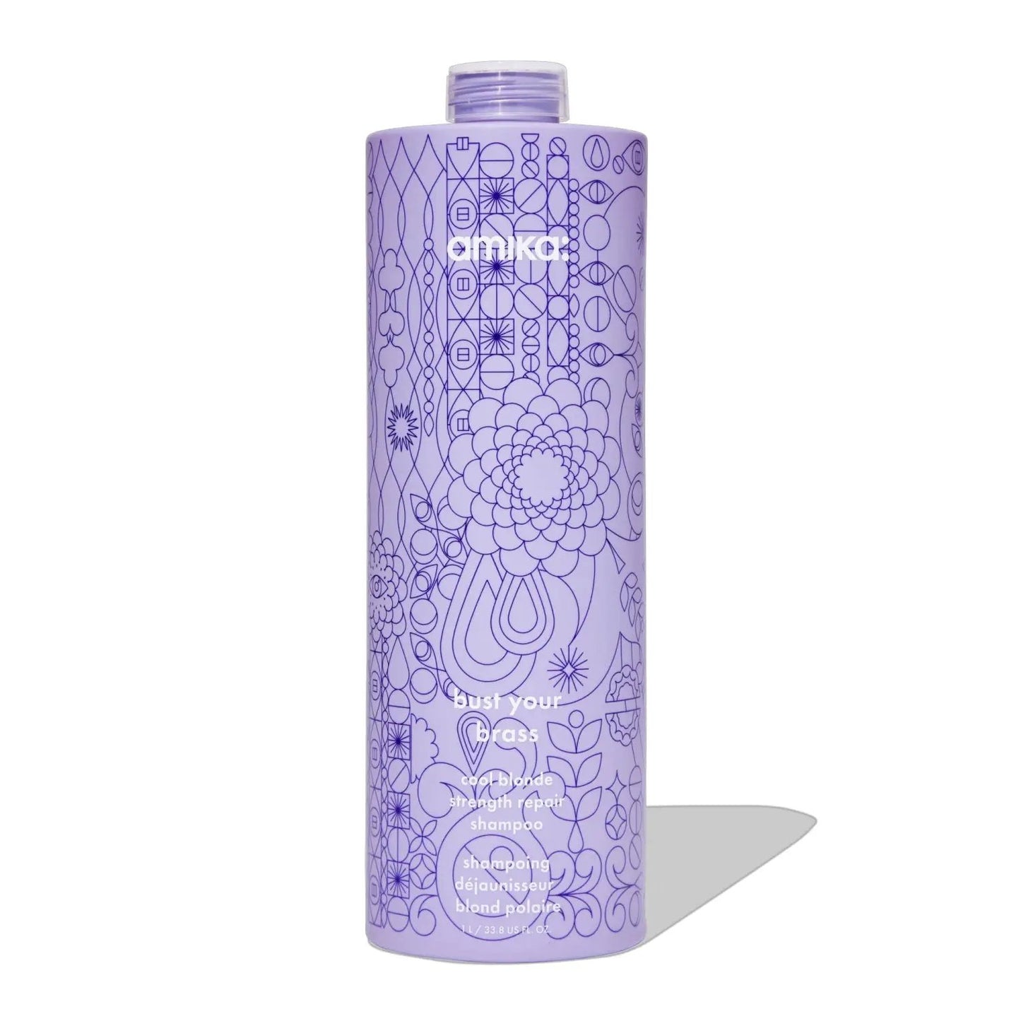 Amika Bust Your Brass Cool Blonde Repair Shampoo bottle, purple with intricate geometric pattern on Tampa Home & Garden Store
