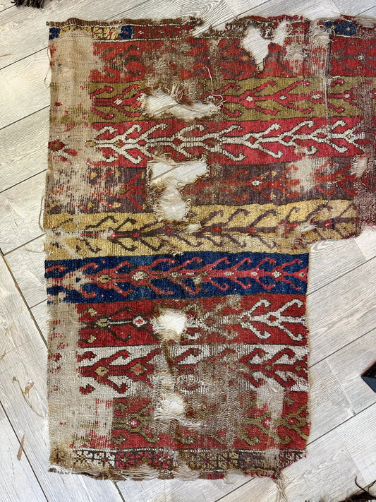 Anatolian tribal wool fragment rug red blue gold pattern hand-woven Rugistan on Tampa Home & Garden Store