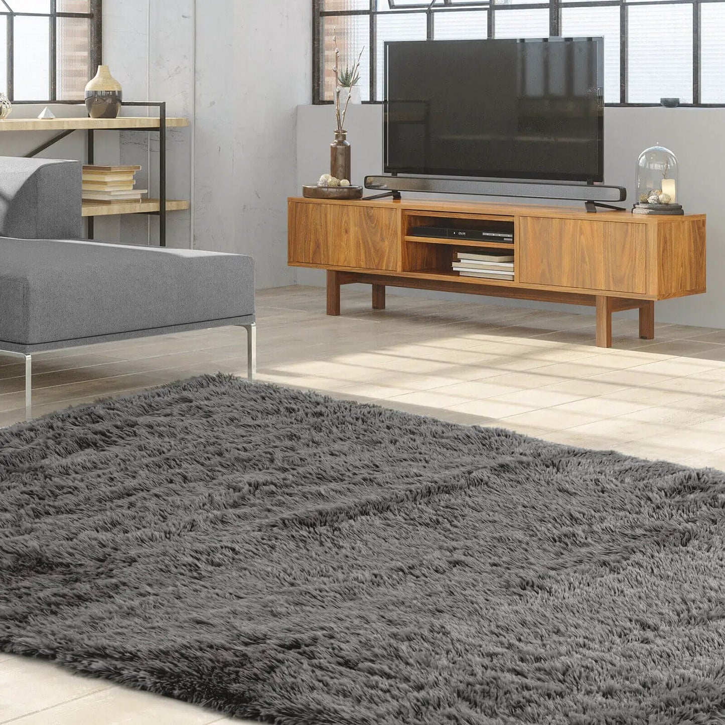 5 x 7 ft DirectDeals modern soft shag rug in gray on living room floor with a TV console on Tampa Home & Garden Store