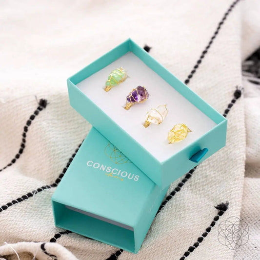 Amethyst Tranquility Anti Stress Rings set of 4 with gold-wire wraps in turquoise Conscious Items box on Tampa Home & Garden Store