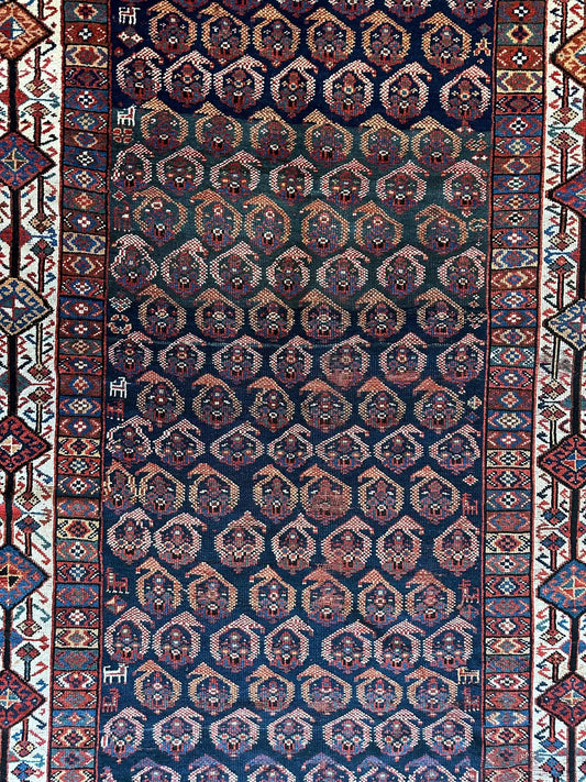 Antique Afshar Kurdish Paisley handmade rug with navy field and teardrop motifs; red ivory border on Tampa Home & Garden Store