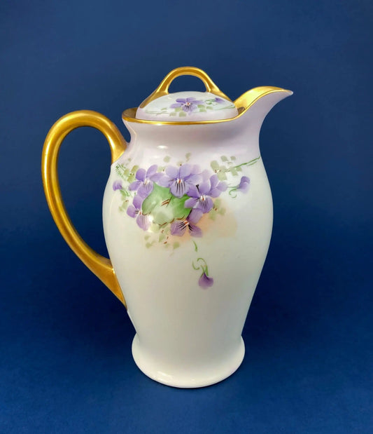 Antique Bavarian coffee pot with hand-painted violets, white porcelain and gold trim on Tampa Home & Garden Store