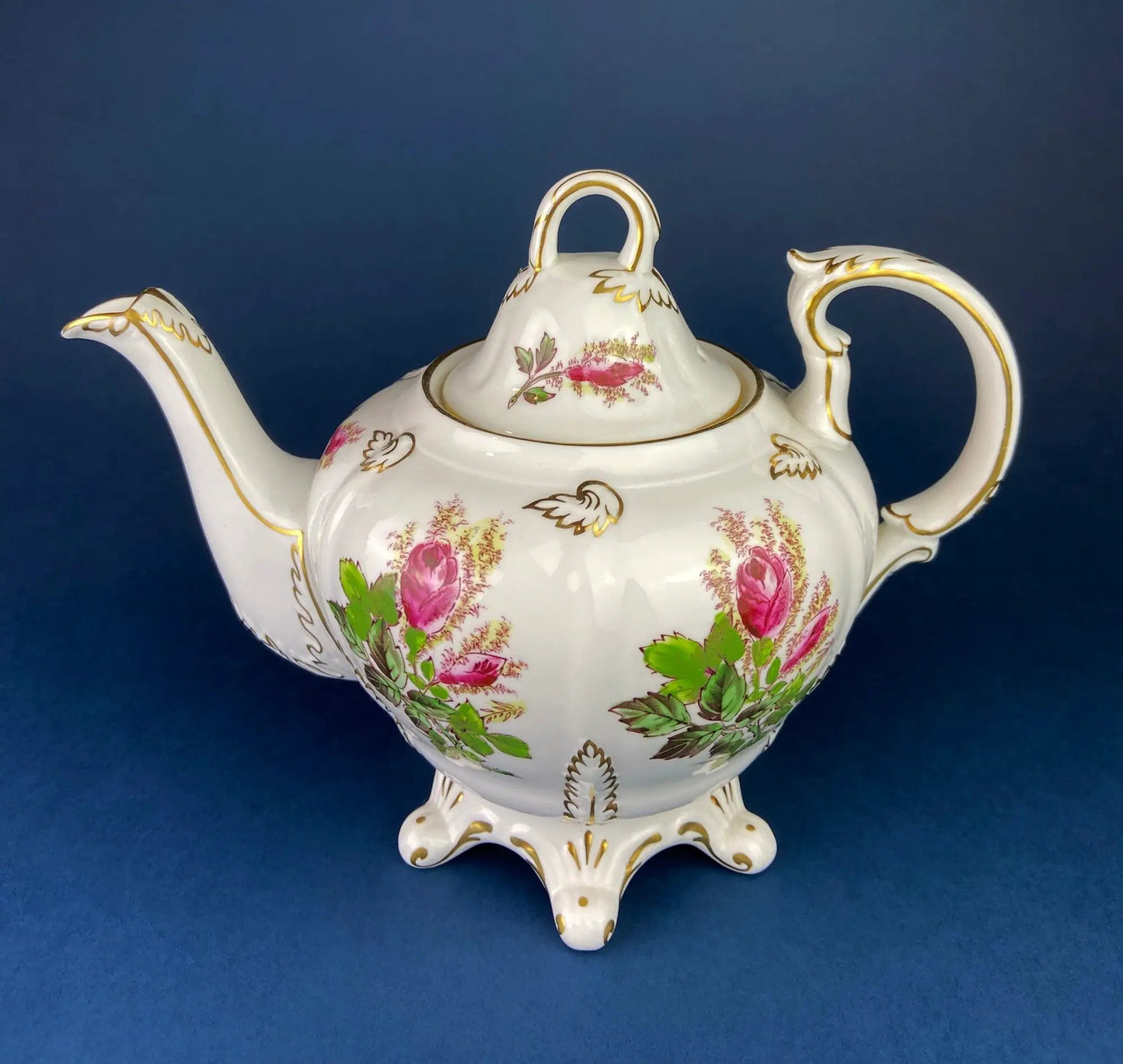 Antique Bavarian coffee pot with hand-painted violets on white porcelain with gold trim on Tampa Home & Garden Store