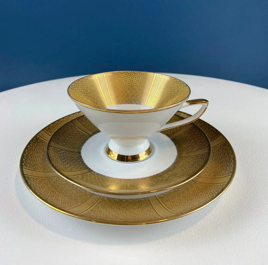 Antique Bavarian porcelain tea cup trio with white body and gold geometric trim on Tampa Home & Garden Store