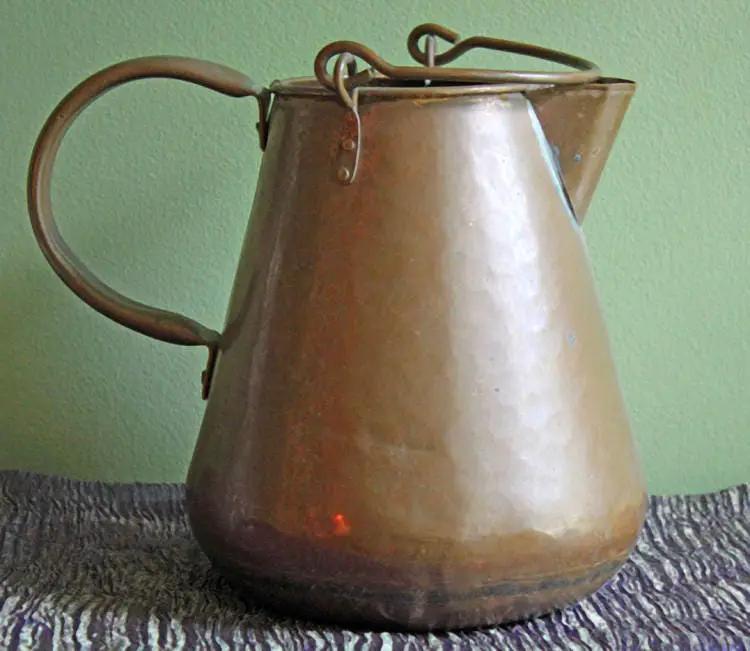 Antique brass creamer pitcher by Anything Discovered, hammered finish with lid on Tampa Home & Garden Store