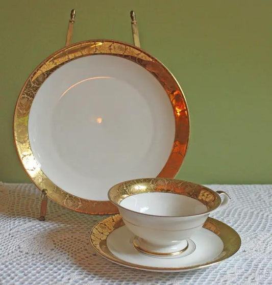 Antique Bavarian porcelain tea trio with gold floral trim: cup, saucer, and large plate on Tampa Home & Garden Store