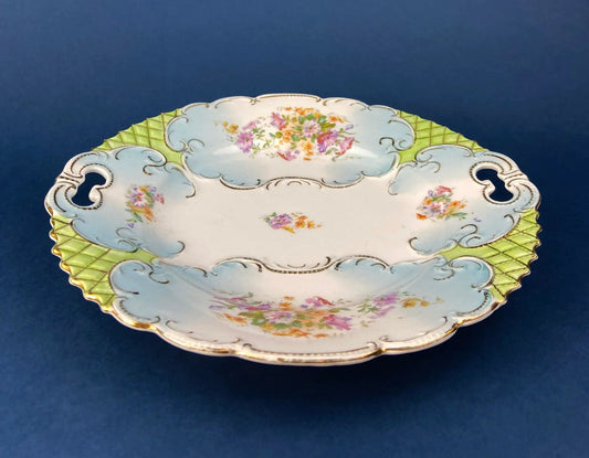 Antique porcelain plate with gold lattice rim and blue center decorative plate on Tampa Home & Garden Store