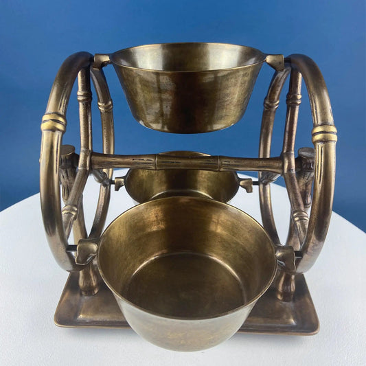 Antique brass Ferris wheel decorative bowls for candy nuts, weathered with curved arms on Tampa Home & Garden Store
