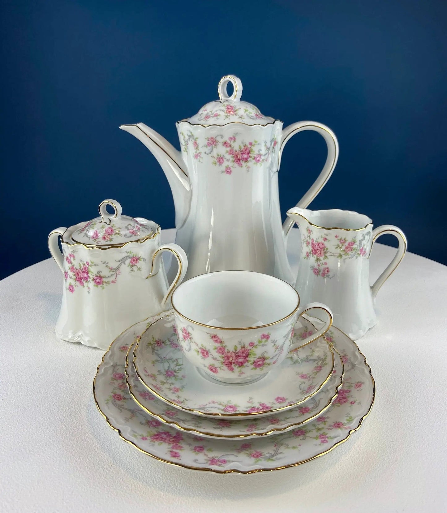 Hutschenreuther porcelain tea set with pink floral motif and gold trim teapot and cups on Tampa Home & Garden Store
