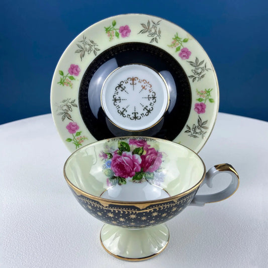 Antique Lefton tea cup and saucer with pink rose motif, black band and gold trim on Tampa Home & Garden Store