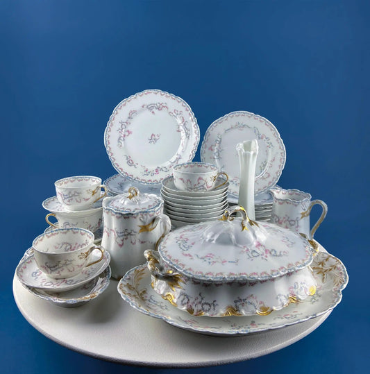 Limoges dinnerware set for 8 Forget-Me-Nots porcelain with scalloped borders and gold trim on Tampa Home & Garden Store