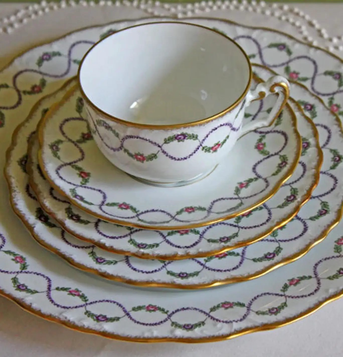 Antique Limoges porcelain tea set with clover vine motif and gilded rims on Tampa Home & Garden Store