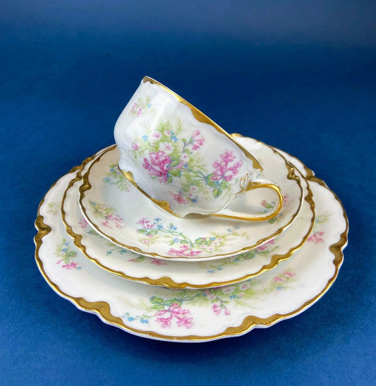 3-piece teacup and saucer set from antique Limoges with forget-me-nots and roses, gold trim on Tampa Home & Garden Store