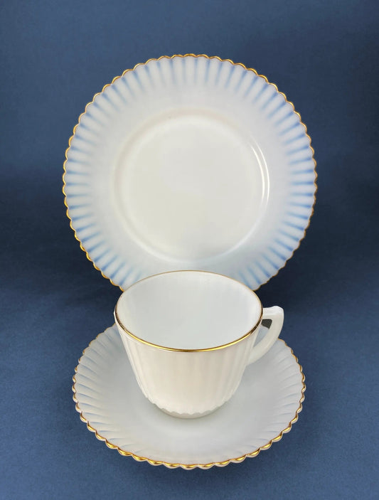 Antique Monax Petalware opalescent tea set with cup, saucer, and two gold-rimmed plates on Tampa Home & Garden Store