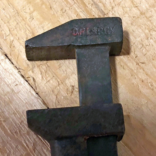 Antique OPI PRY Craft Man wrench with dark metal finish on Tampa Home & Garden Store