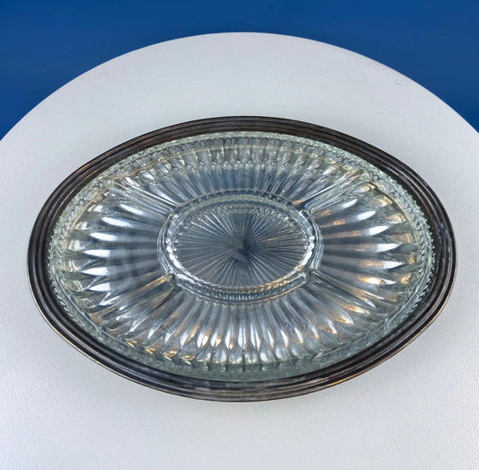 Antique oval silver and glass serving platter with ribbed glass center and dark rim on Tampa Home & Garden Store