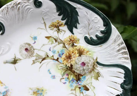 Antique porcelain platter with dandelion and forget-me-not floral pattern and green border on Tampa Home & Garden Store