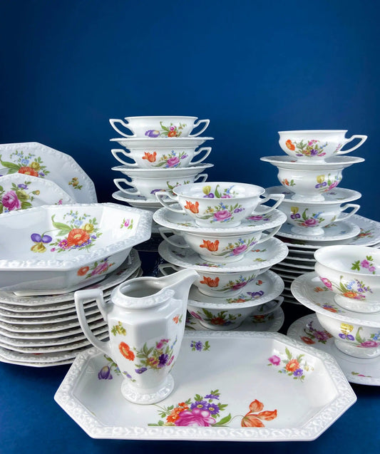 Rosenthal 38-piece floral dinnerware set in white porcelain with bright blooms on Tampa Home & Garden Store