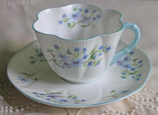Antique Shelley cup and saucer porcelain set in Blue Rock floral pattern with scalloped rim on Tampa Home & Garden Store