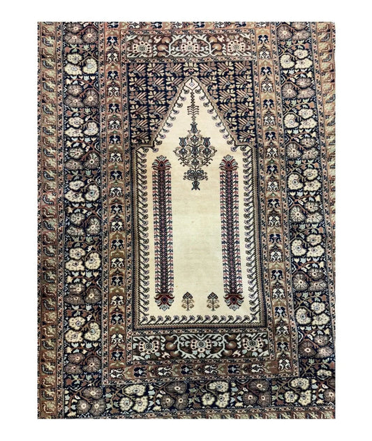 Antique Turkish Panderma prayer rug with beige central field and ornate navy floral border on Tampa Home & Garden Store