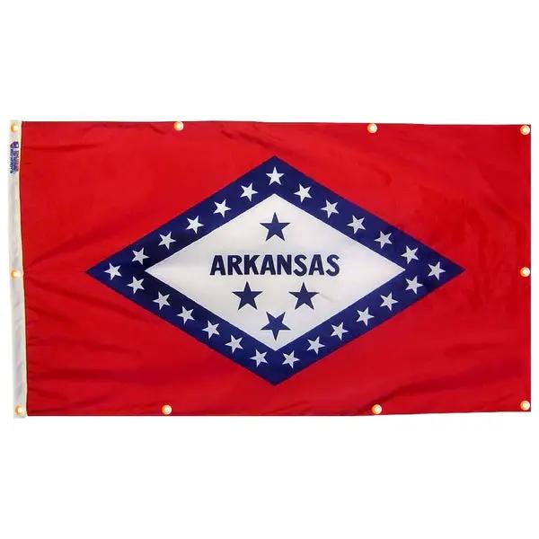 Arkansas flag with grommets; red field, white center diamond, blue star border on Tampa Home & Garden Store