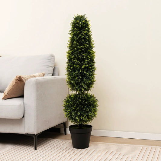 4 ft artificial boxwood topiary with green PE leaves in a black planter beside a beige sofa indoors on Tampa Home & Garden Store
