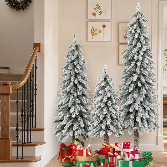Snow-flocked artificial Christmas trees set of 3 in varying sizes with gifts beneath on Tampa Home & Garden Store