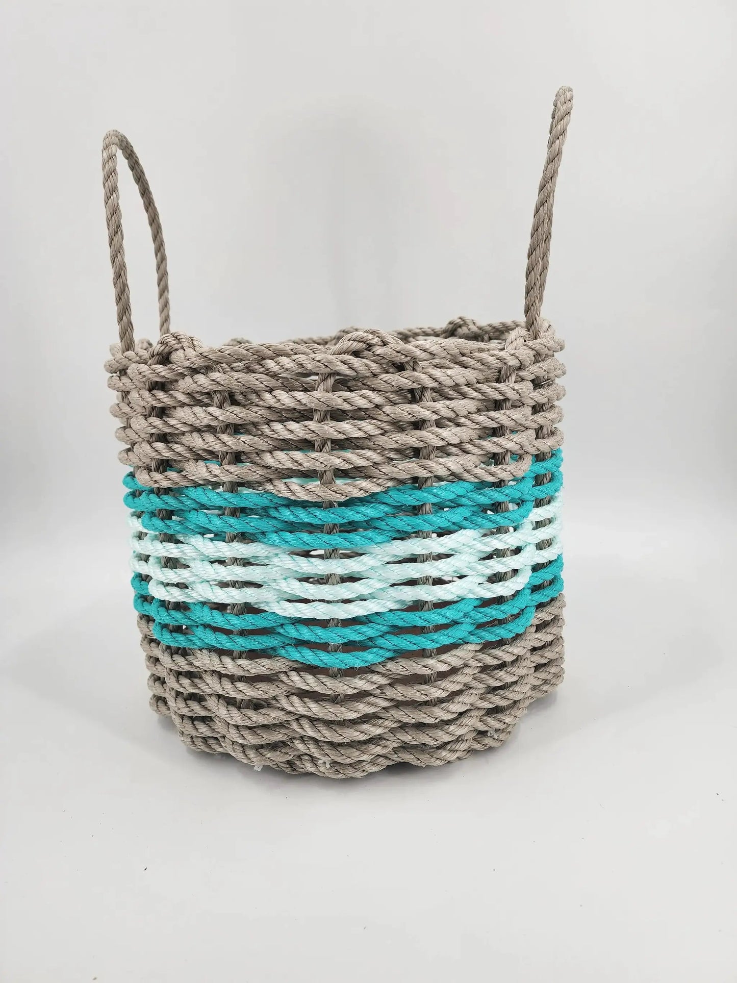 Maine lobster rope storage basket handwoven in tan and seafoam with braided handles on Tampa Home & Garden Store