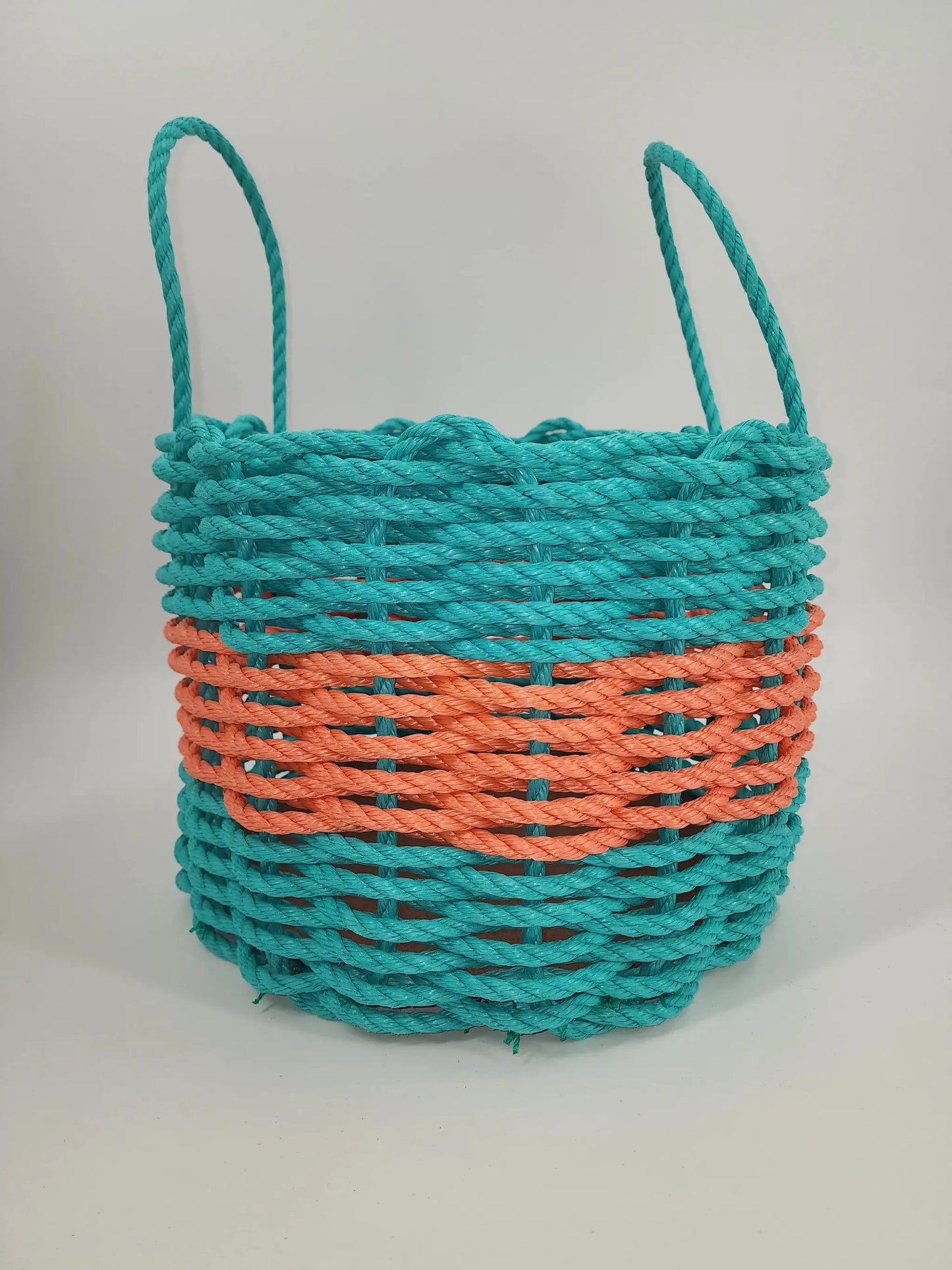 Maine Lobster Rope storage basket in teal and coral with dual handles by Little Salty Rope on Tampa Home & Garden Store