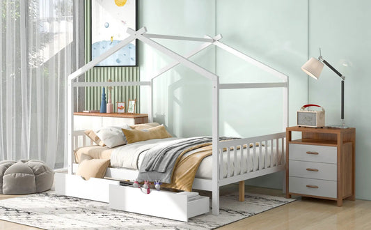 White full-size house-frame platform bed with two foot drawers in a pale mint bedroom on Tampa Home & Garden Store