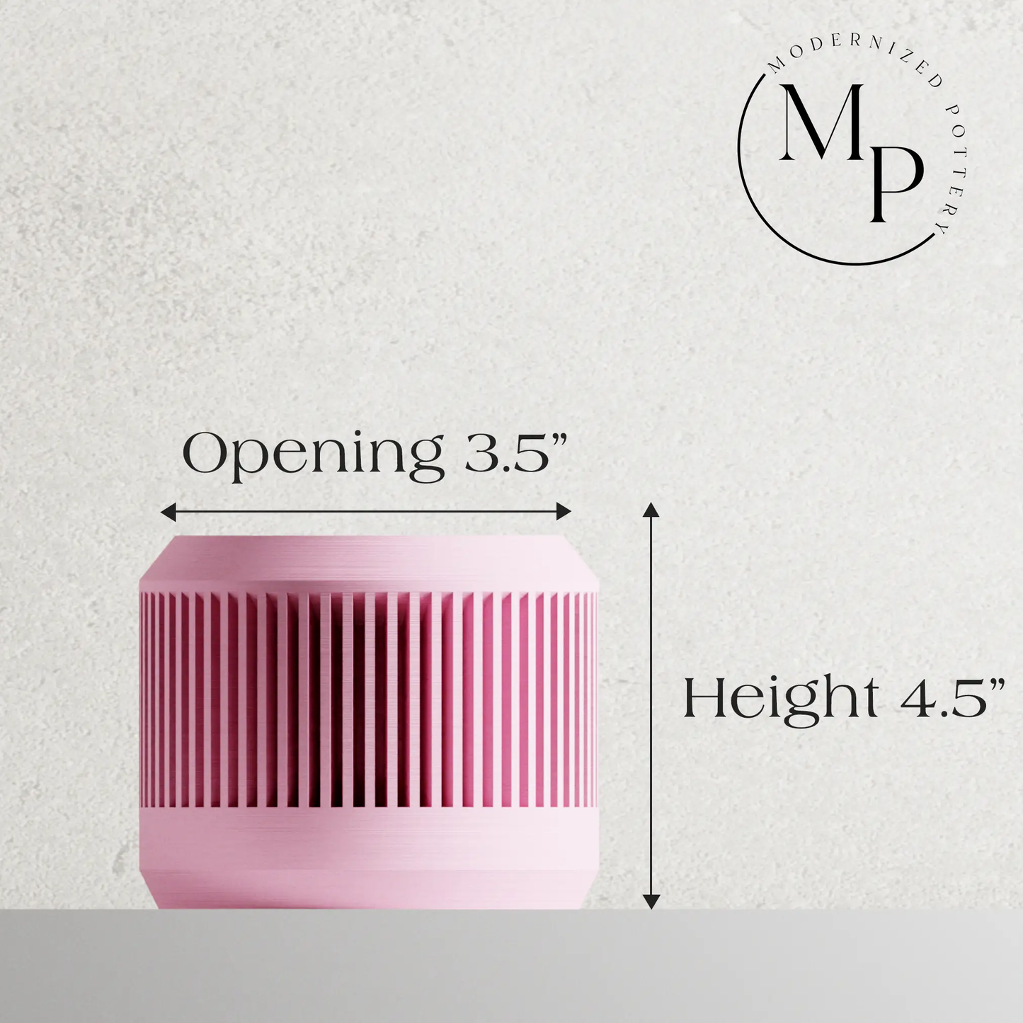 Planter pink ribbed with vertical grooves and modern look; Modernized Pottery logo visible on Tampa Home & Garden Store