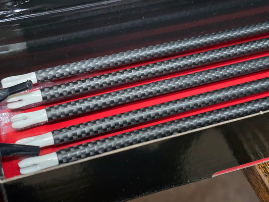 Battle-Ax arrow shafts by Killz Products, carbon fiber with red accents and white nocks on Tampa Home & Garden Store