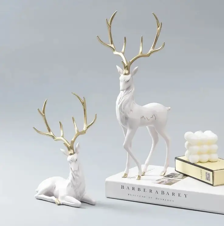 Golden deer ornament set of 2 with white bodies and gold antlers, festive home decor on Tampa Home & Garden Store