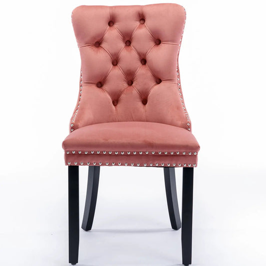 Pink velvet tufted dining chair with diamond buttons, nailhead trim, black wooden legs on Tampa Home & Garden Store