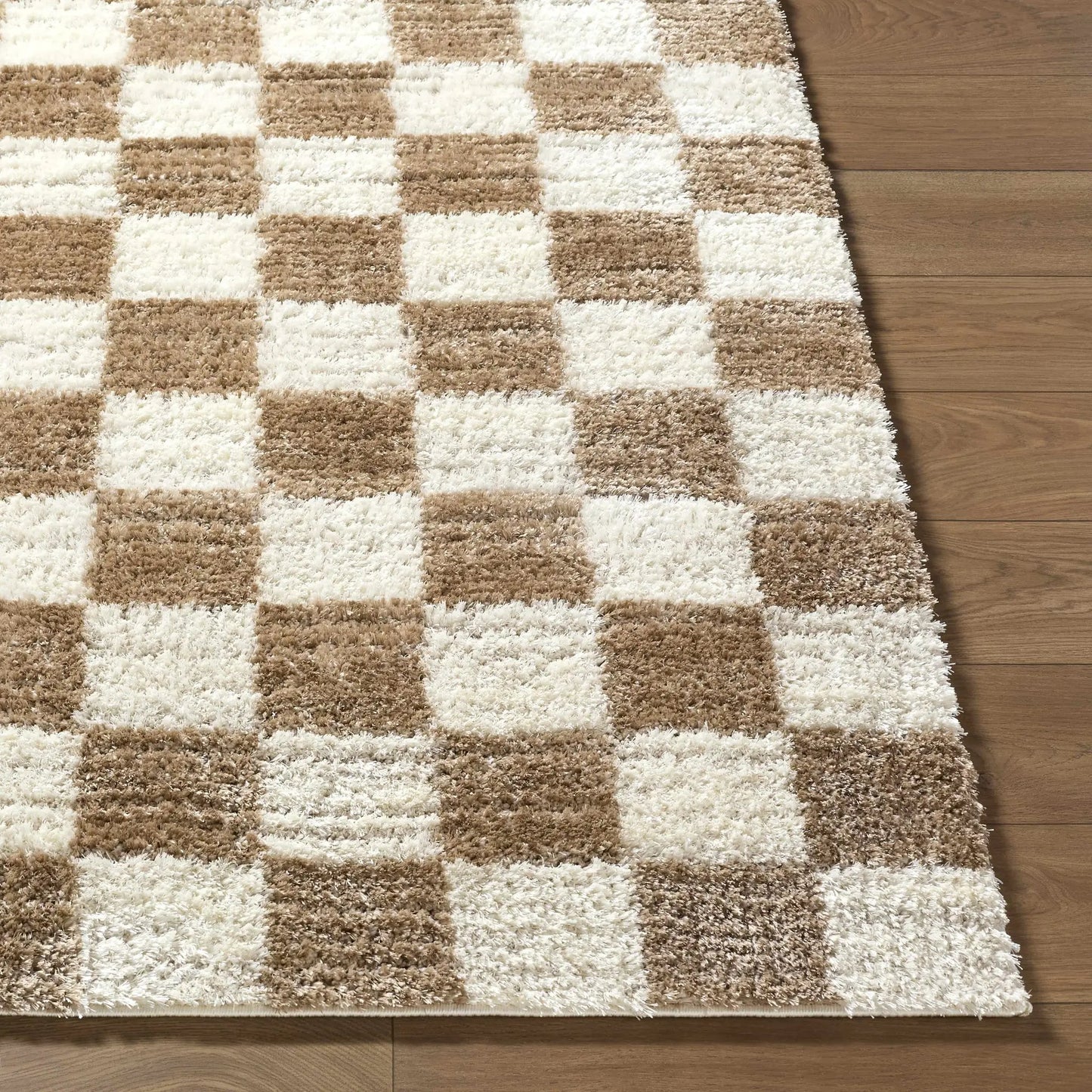 Belita Cream Luxe Shag Area Rug machine-woven with brown ivory checker blocks on wood floor on Tampa Home & Garden Store