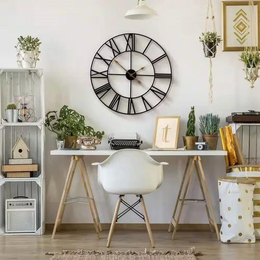 24-inch black metal Roman numeral wall clock with circular open-frame design and gold hands on Tampa Home & Garden Store