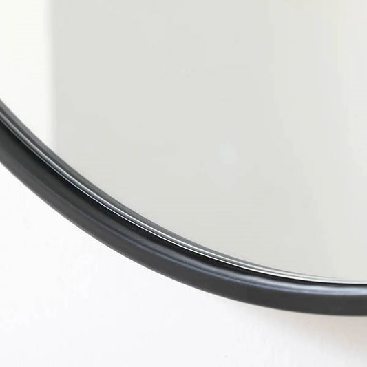 Round 39-inch black wall mirror by HomePacific with a slim metal frame and chrome trim on Tampa Home & Garden Store