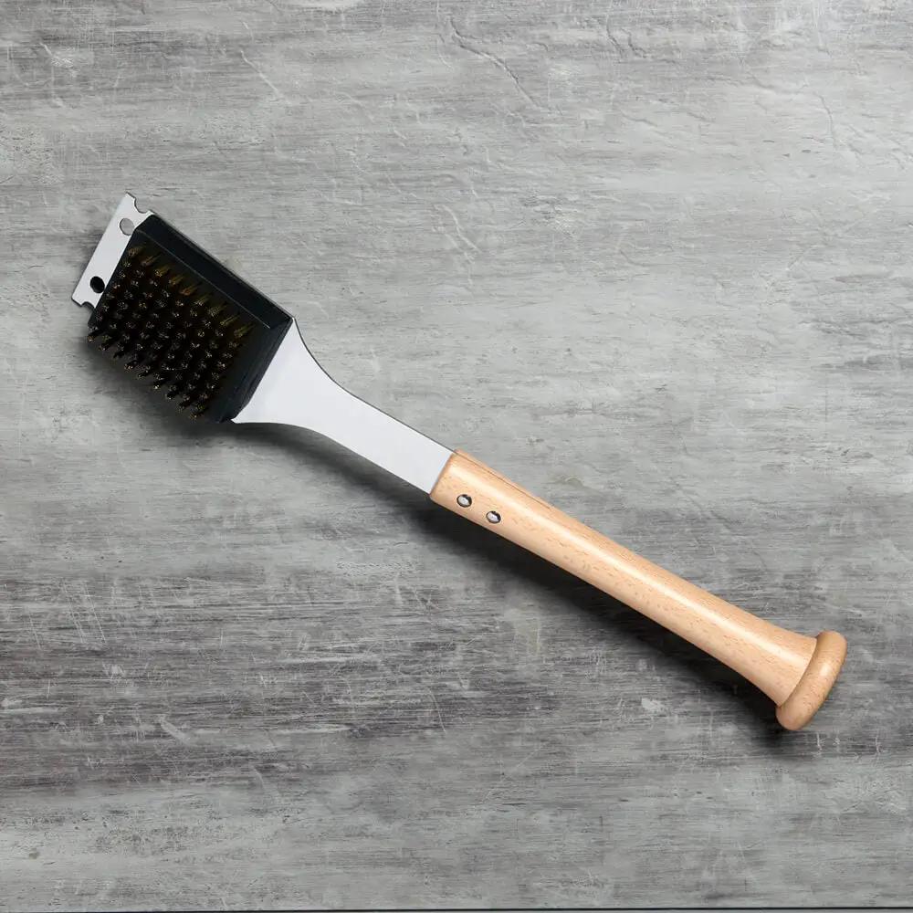 Brushback Grill Scraper and Bristle Cleaner BBQ tool with wood handle and black bristle head on Tampa Home & Garden Store