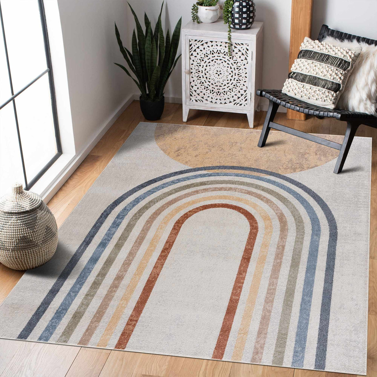 Giza washable area rug with multicolor arc stripes in blue, beige, rust on light gray backdrop on Tampa Home & Garden Store