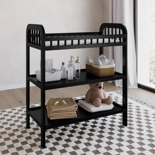 Black wood finish changing table with safety rail and two shelves, baby essentials on level on Tampa Home & Garden Store