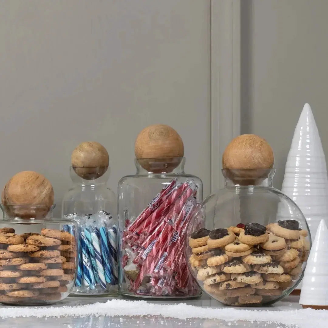 Baylor glass canister set with cork lids, 4 jars filled with cookies and candy canes on Tampa Home & Garden Store