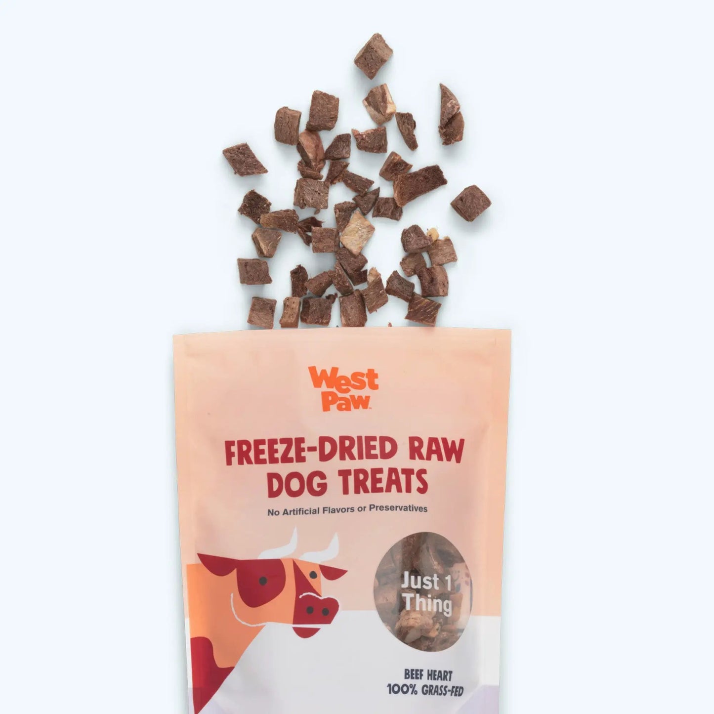 Beef Heart Freeze-Dried Dog Treats West Paw; scattered brown cubes above pink bag on Tampa Home & Garden Store