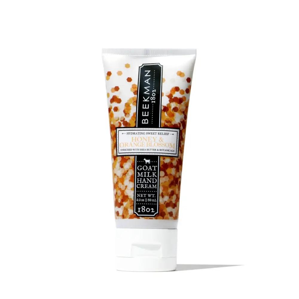 Beekman 1802 Honey & Orange Blossom Hand Cream tube with honeycomb pattern and white cap on Tampa Home & Garden Store