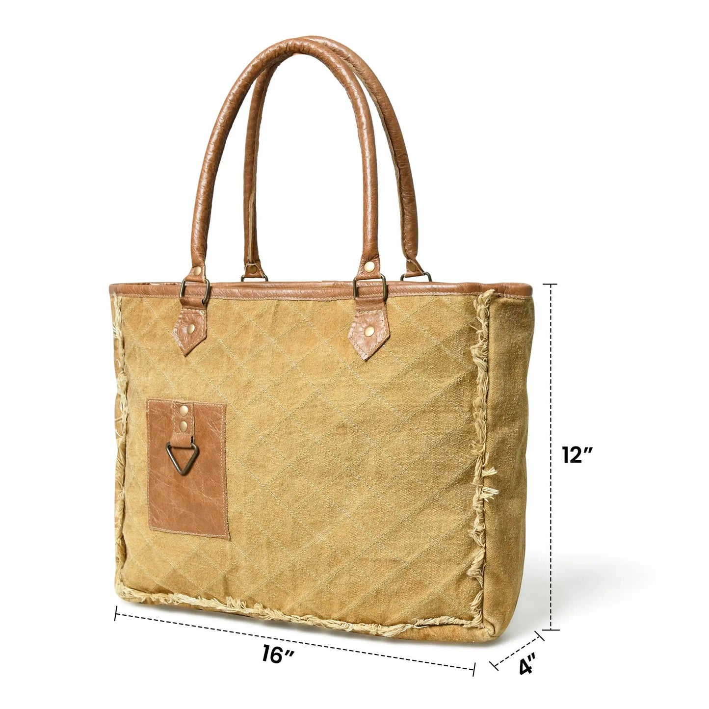 Beige boho chic quilted canvas tote bag with brown leather handles on Tampa Home & Garden Store