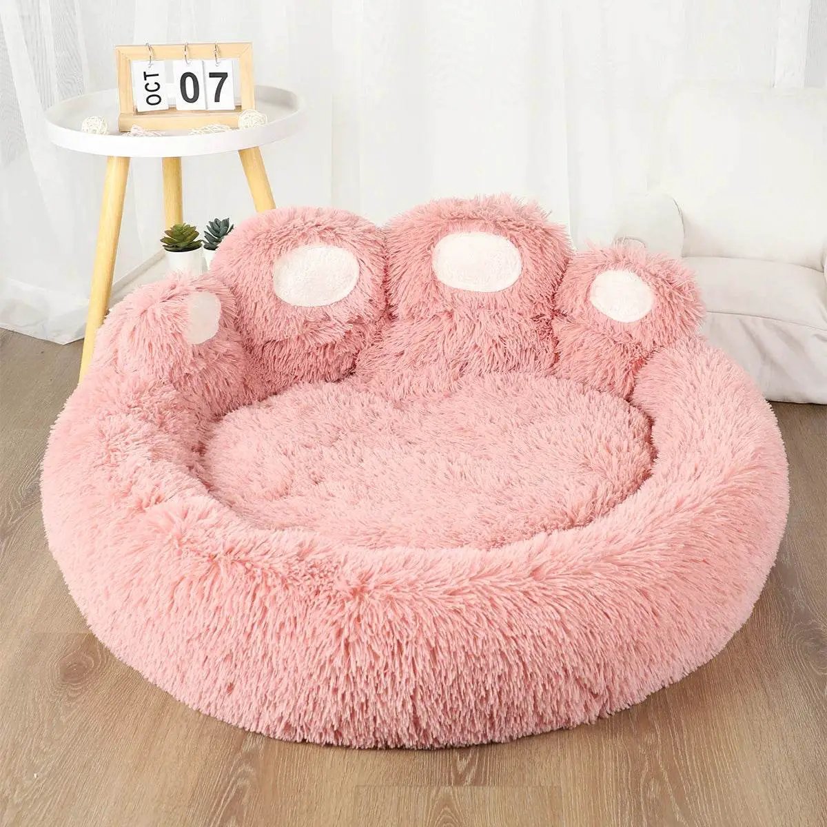 Big Paw Plush Dog Cat Sofa Bed with calming raised edges, plush pink donut-style pet bed on Tampa Home & Garden Store