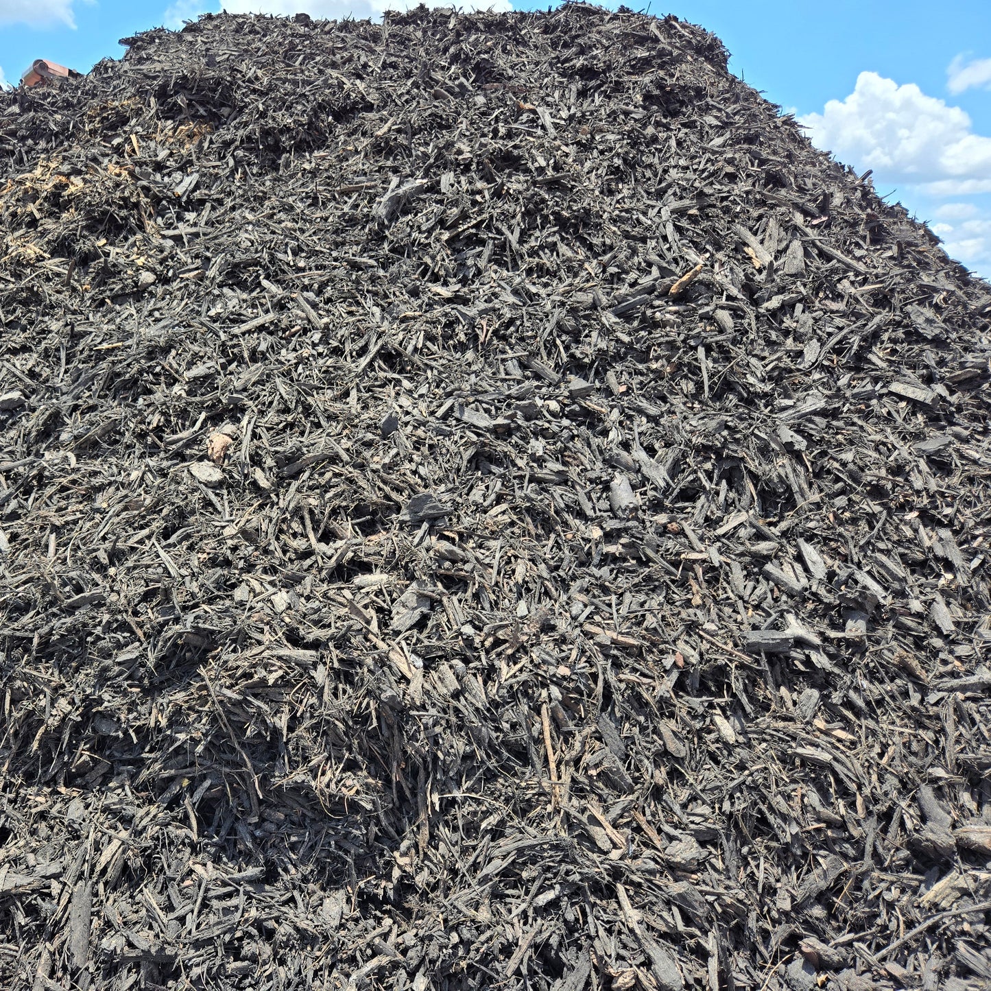 Order a Truckload of Black Mulch Delivery - Tampa soil911.com