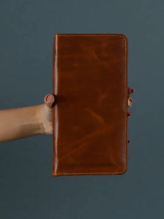 Blair Women's Wallet Tan Brown buffalo leather held in hand on Tampa Home & Garden Store